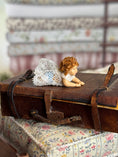 Load image into Gallery viewer, Curly Haired Tummy-Laying Sculpted Rubber Baby Girl Doll, side view 2
