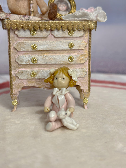 Sculpted Clay Baby Girl Doll in Pink Pajamas with Teddy Bear, front view