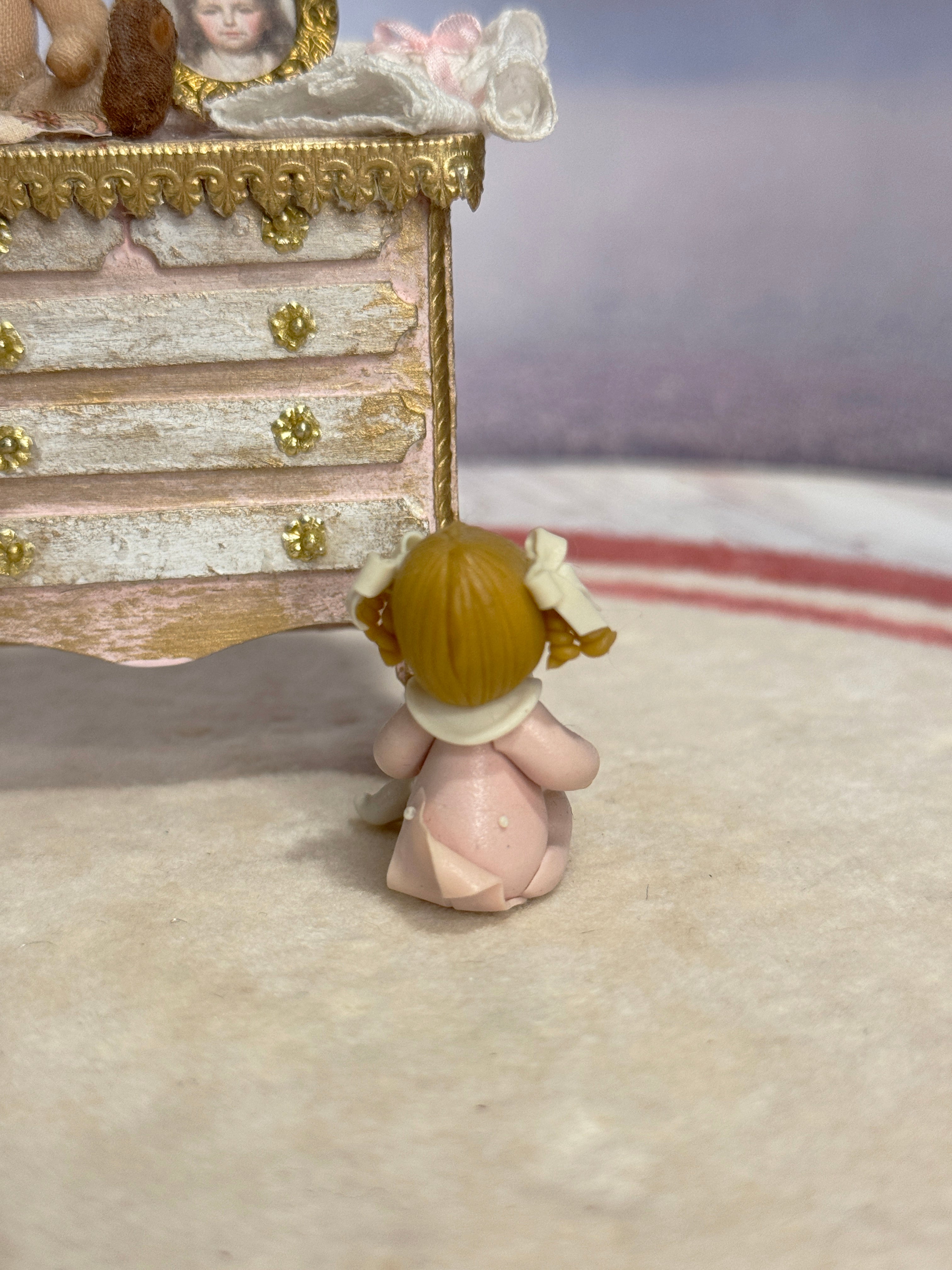 Sculpted Clay Baby Girl Doll in Pink Pajamas with Teddy Bear, back view