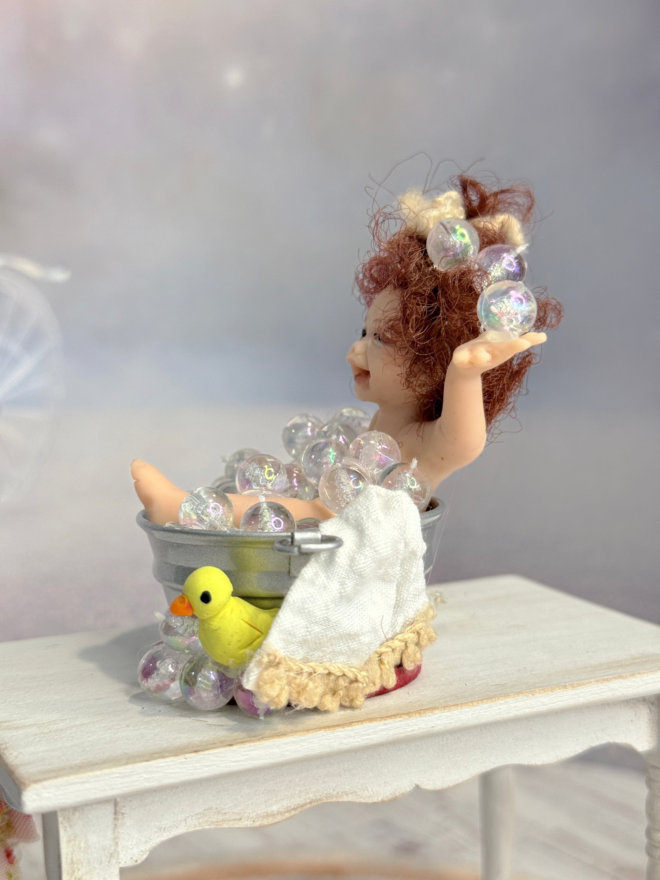 Fun Sculpted Clay Bathing Baby Infant Doll in Tub of Bubbles Diorama, left side view