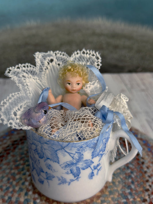 Tea Cup & Bluebird Diorama with Jointed Porcelain Baby Doll, front view