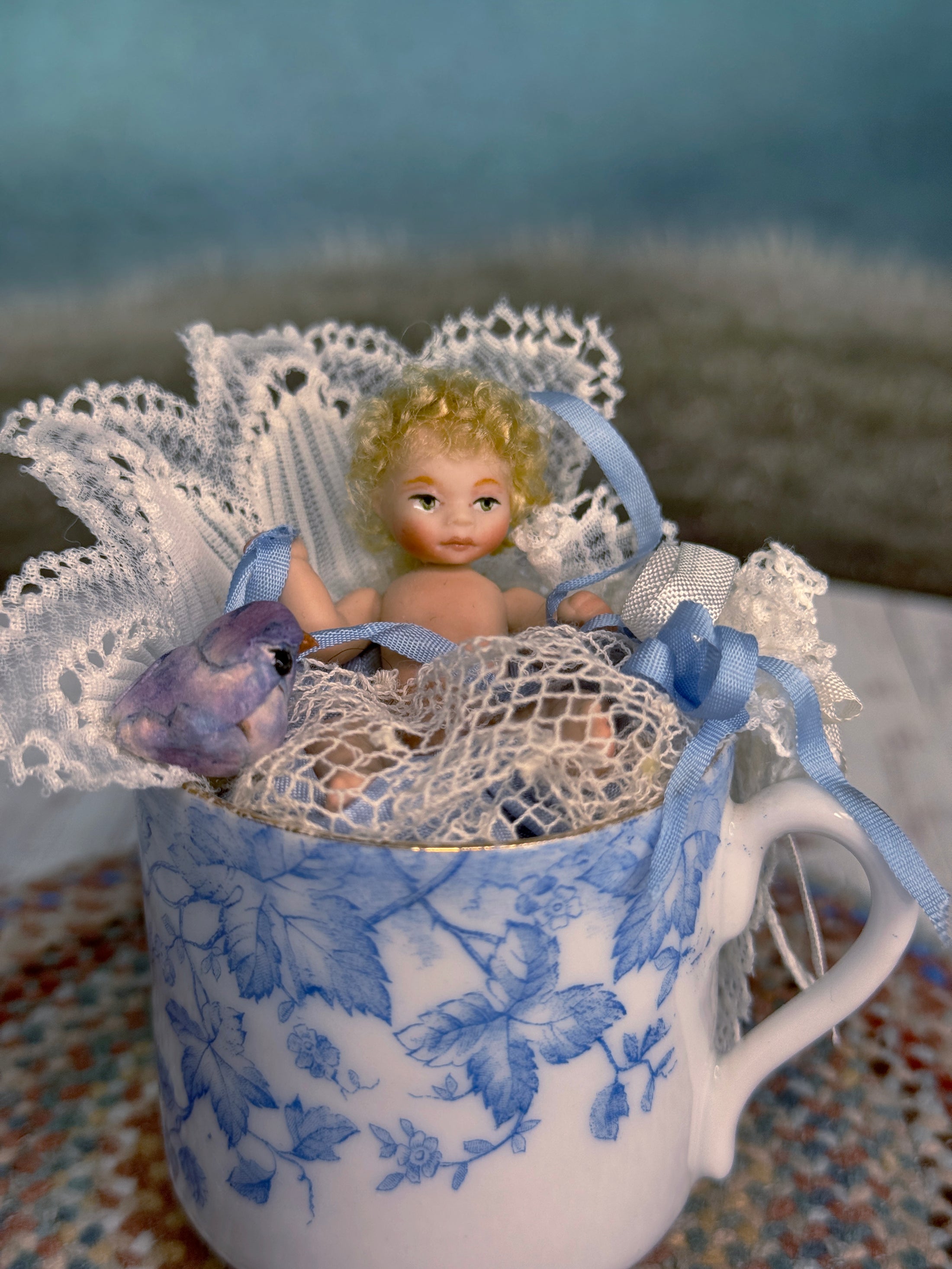 Tea Cup & Bluebird Diorama with Jointed Porcelain Baby Doll, zoom in view