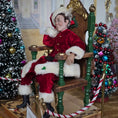 Load image into Gallery viewer, Santa dollhouse doll sitting on a throne with Christmas trees in the background
