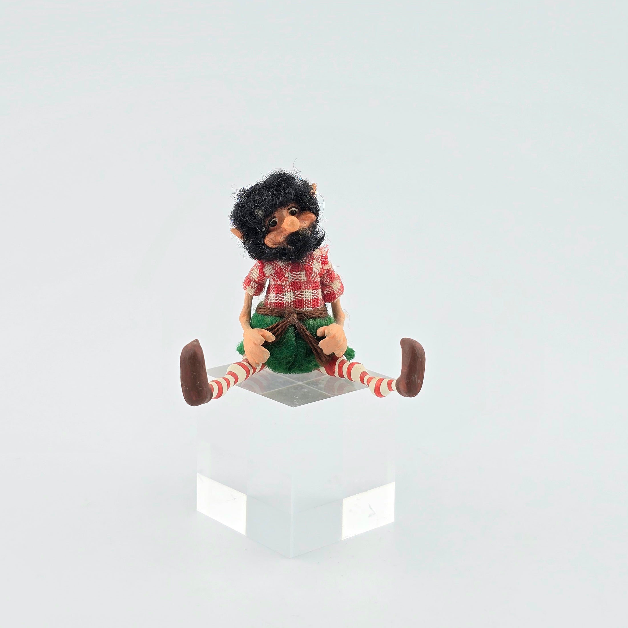 black-bearded elf dollhouse doll on white background