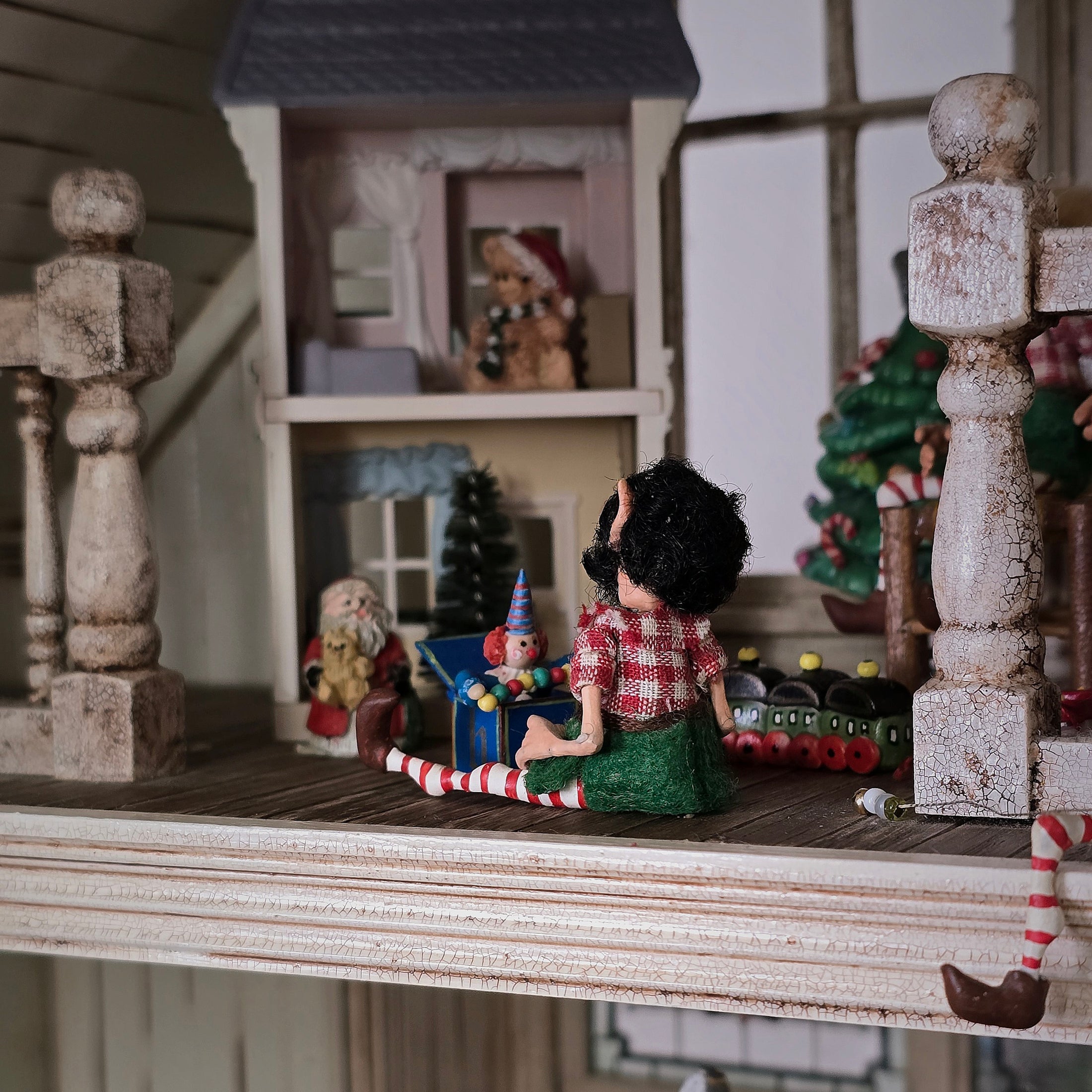 back of black-bearded elf dollhouse doll
