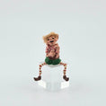 Load image into Gallery viewer, Grinning Elf Christmas Doll Cynthia Baron against a white background
