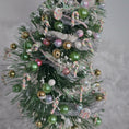 Load image into Gallery viewer, Decorative Christmas tree with colorful ornaments on a gray background
