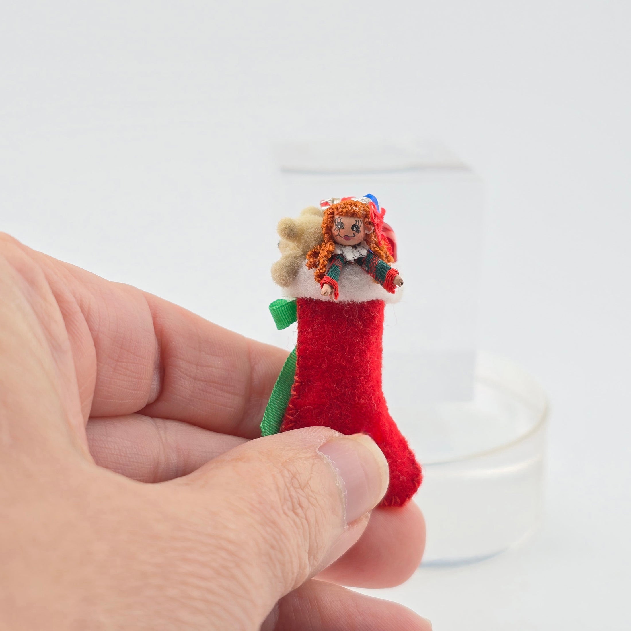 the stocking held inside a hand