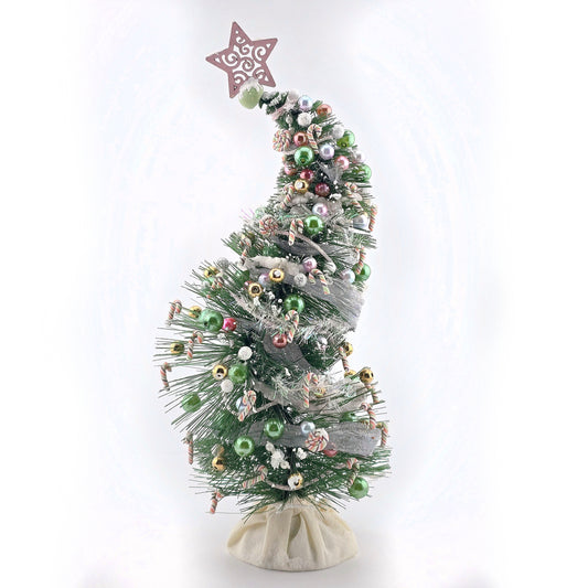 Decorated Christmas tree with ornaments on a white background