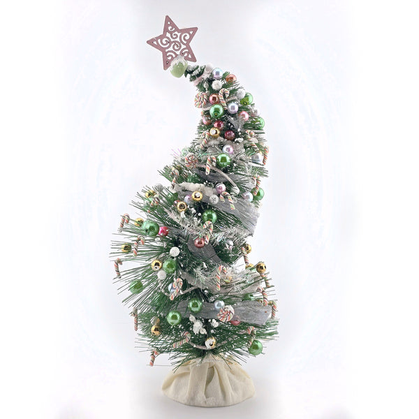 Decorated Christmas tree with ornaments on a white background