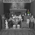 Load image into Gallery viewer, Black and white miniature room setup with furniture and decorative items.
