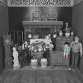 Load image into Gallery viewer, Vintage dollhouse with detailed furniture and figures in a room setting.
