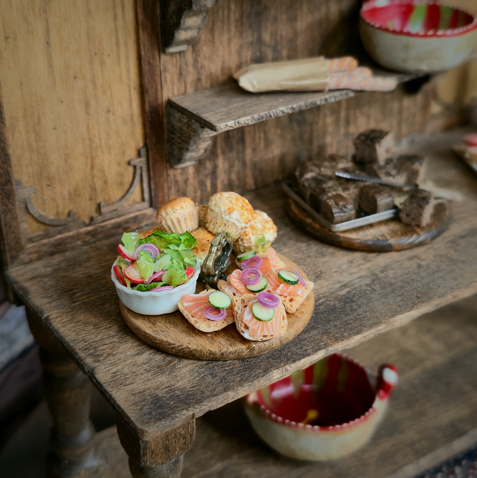 Miniature food display on a wooden table with a rustic setting