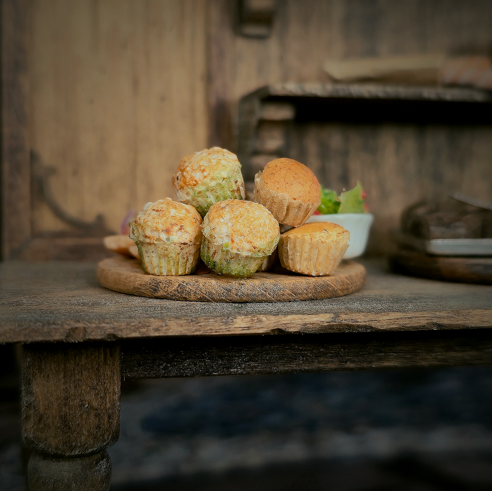 Muffins on a wooden board with a rustic background