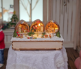 Load image into Gallery viewer, Volker Arnold Illuminated Walnut Shell Christmas Town Workshop Diorama 1:144
