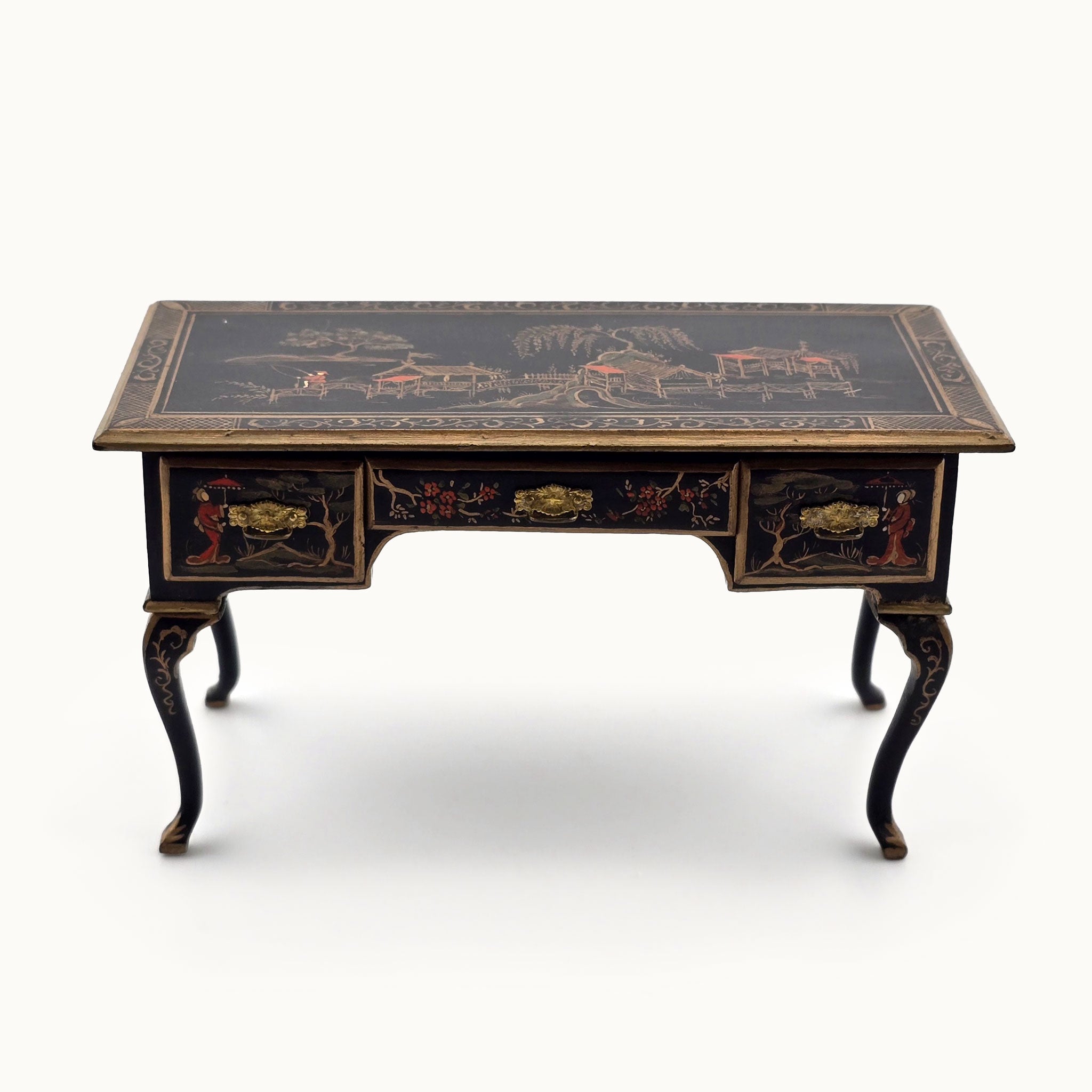 Decorative desk with intricate designs on a white background