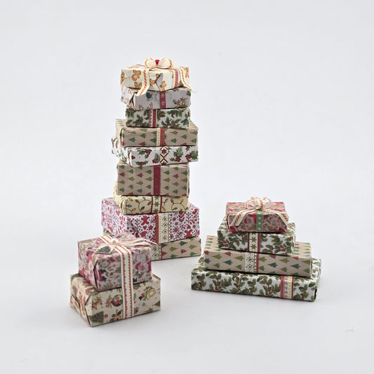 Stacks of decorative gift boxes on a white background
