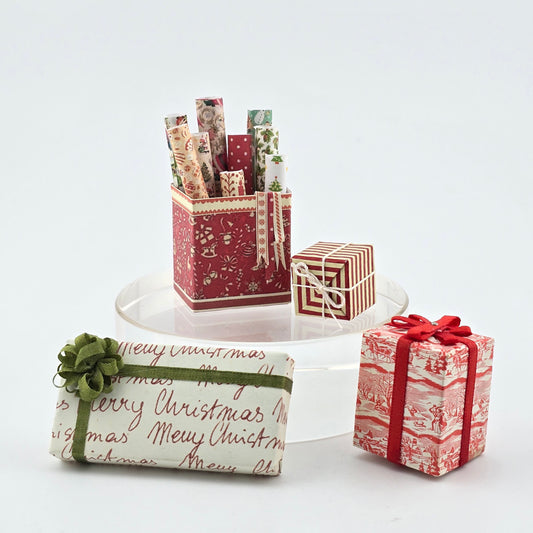 Decorative Christmas gift boxes with ribbons on a white background