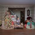 Load image into Gallery viewer, Diorama of a child in a living room with Christmas decorations and furniture.
