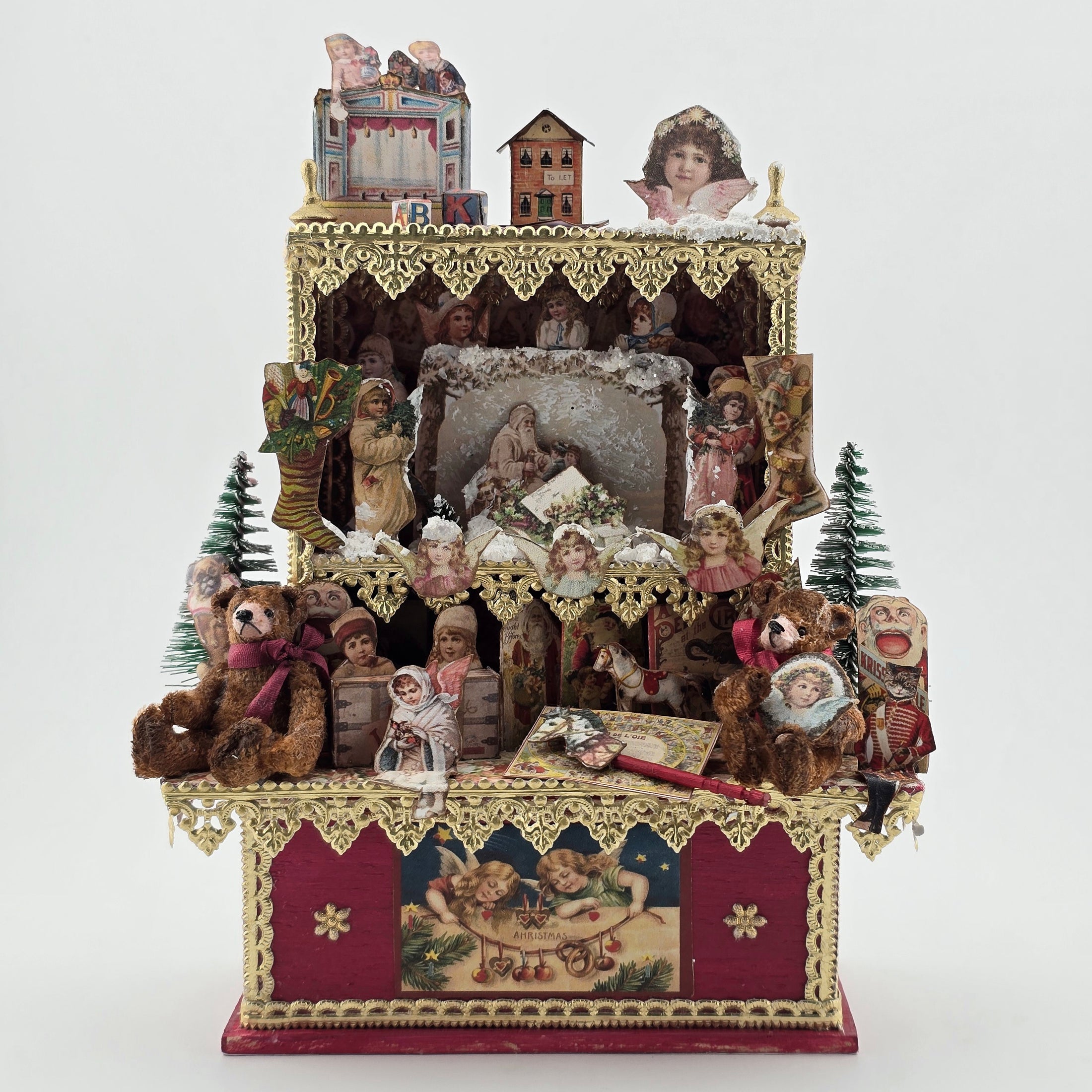 Decorative cabinet with vintage-style toys and teddy bears on a white background