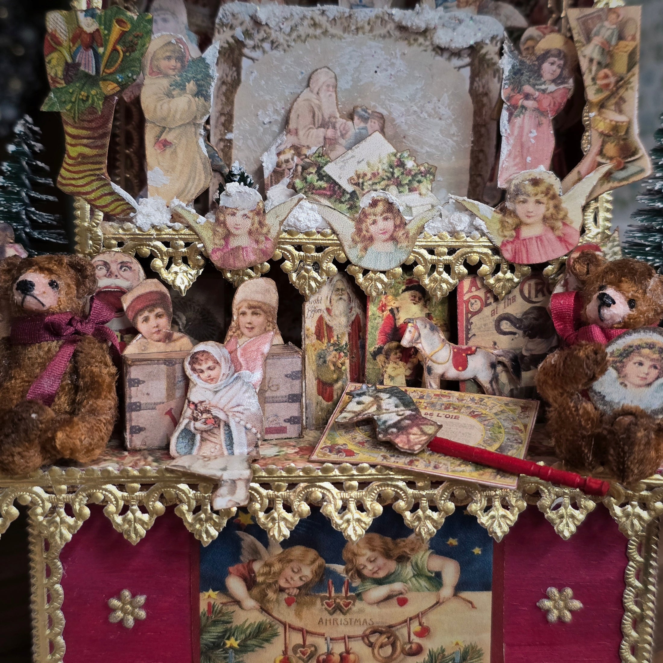 Decorative shelf with vintage-style figurines, teddy bears, and Christmas-themed decorations.