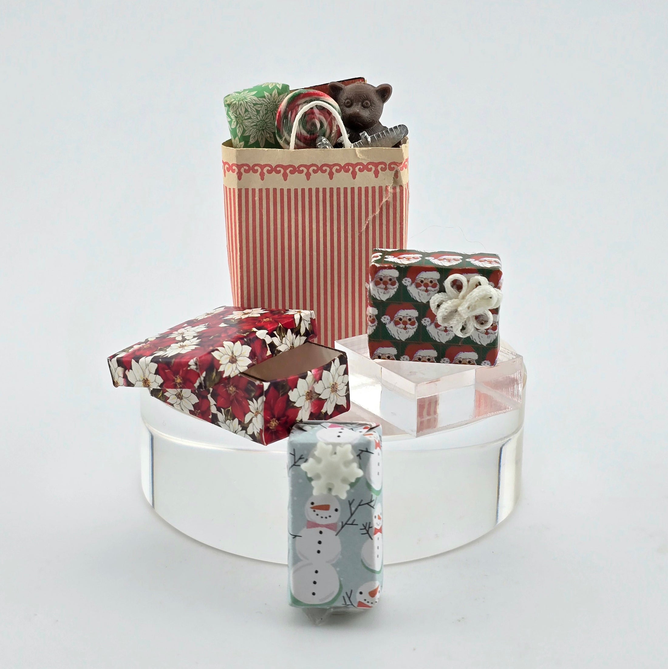 Decorative gift boxes with festive designs on a white background