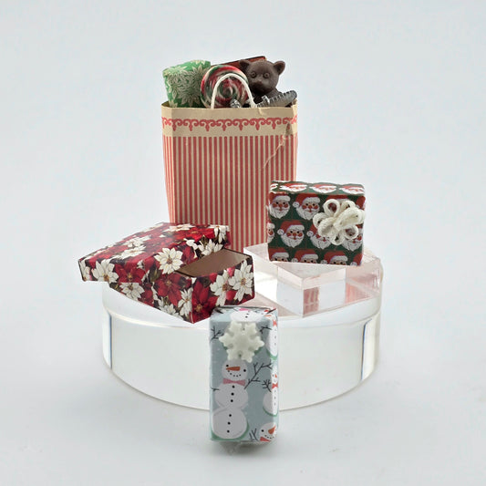 Decorative gift boxes with festive designs on a white background