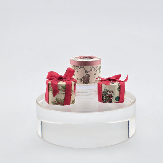 trio of hand wrapped round gift boxes miniature dollhouse Christmas