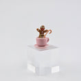 Load image into Gallery viewer, Gingerbread man in a pink cup with a candy cane on a white background

