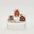 Load image into Gallery viewer, Set of miniature gingerbread houses on a white background
