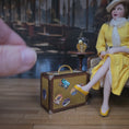 Load and play video in Gallery viewer, Vintage-Style Miniature Travel Suitcase with Roma & Chamonix Travel Stickers
