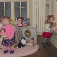 Load and play video in Gallery viewer, Irina Martin Little Girl Dollhouse Doll Holding her Four Micro Dolls
