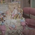 Load and play video in Gallery viewer, Pat Boldt Lace-Filled Wirework Toy Trunk with 6 Bisque Porcelain Dolls & Nursery Toys
