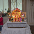 Load and play video in Gallery viewer, Volker Arnold Illuminated German Christmas Market Toy Stall Diorama 1:144 Scale
