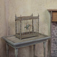 Load and play video in Gallery viewer, Francine Coyon Old World French Birdcage with Swinging Bird Miniature
