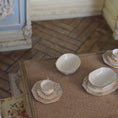 Load and play video in Gallery viewer, Cream & Gold Karen Zorich 19-Piece Porcelain Lattice Tea & Dinner Service
