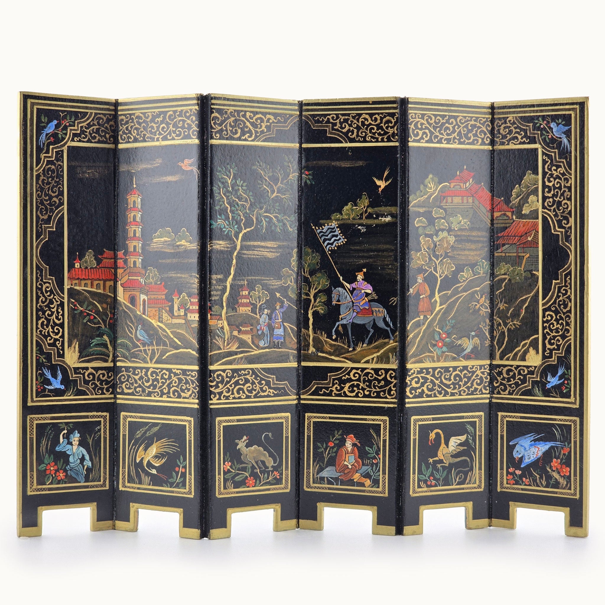 Decorative screen with intricate designs on a white background