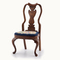 Load image into Gallery viewer, Wooden chair with a petit point floral seat on a white background
