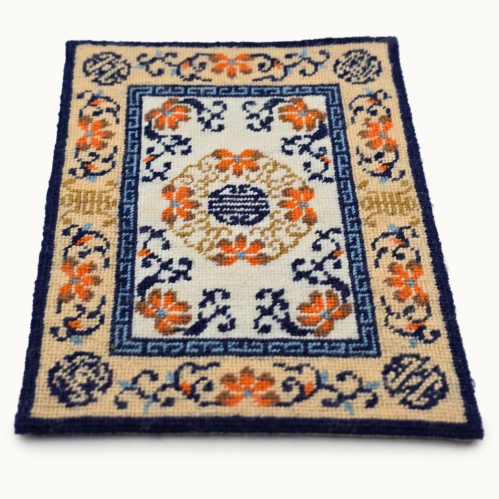 Decorative rug with floral patterns on a white background