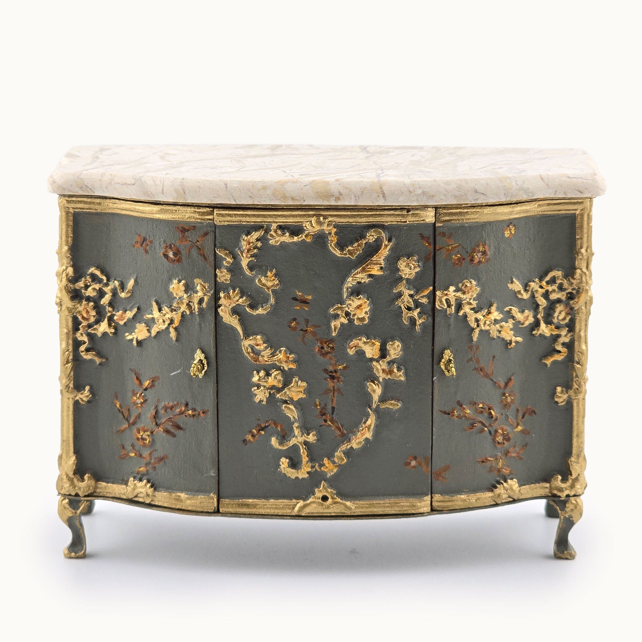 RARE Decorative buffet cabinet with gold floral patterns on a white background. Cristina Noriega Moran