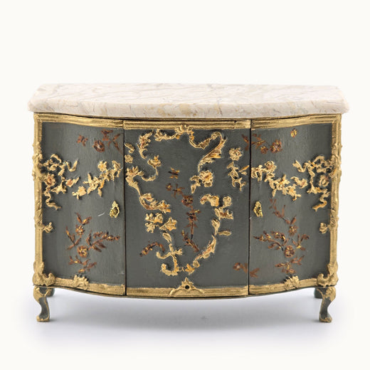 RARE Decorative buffet cabinet with gold floral patterns on a white background. Cristina Noriega Moran