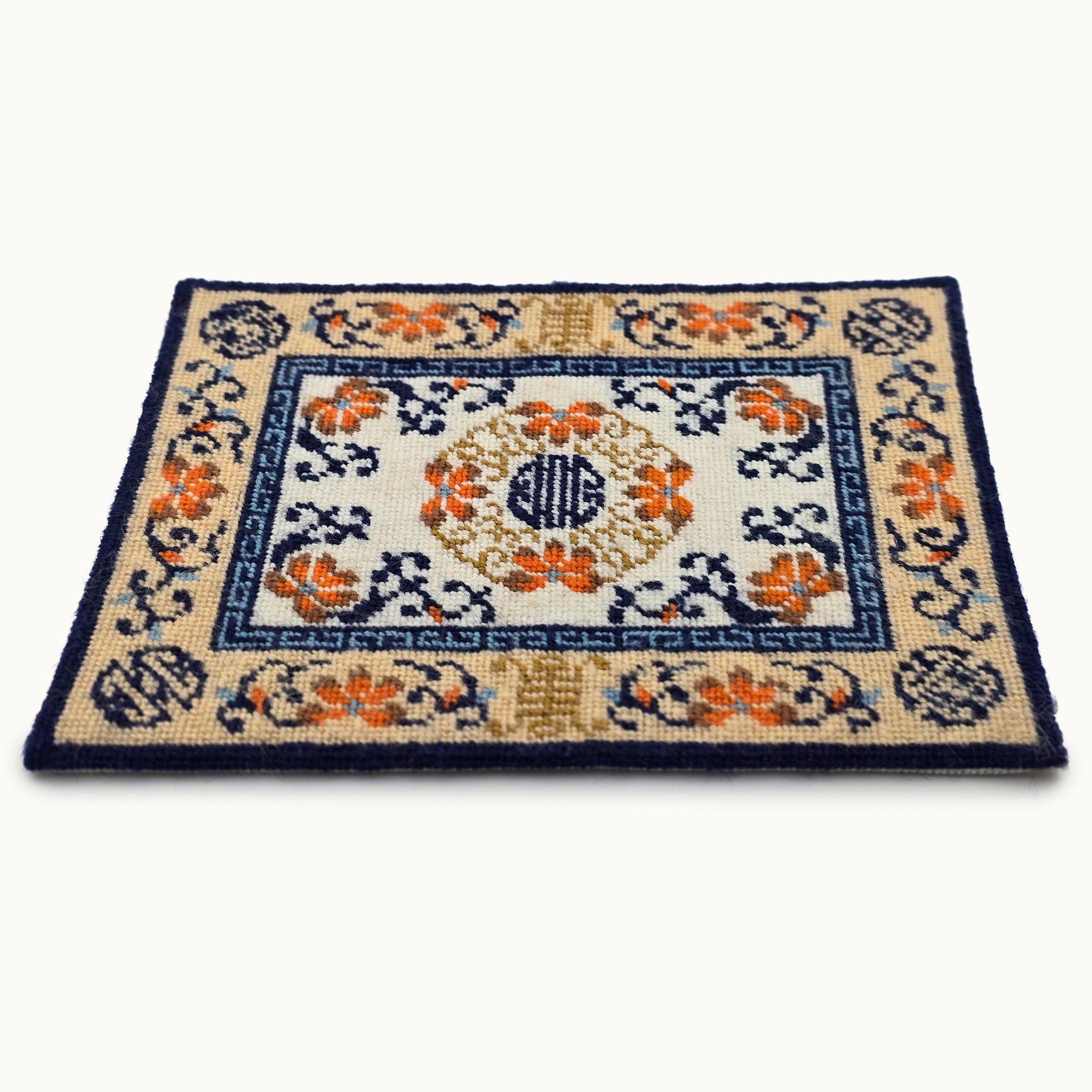 Decorative rug with floral patterns on a white background